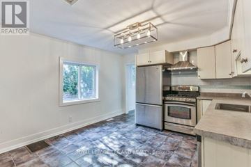 London North (North N) apartment for rent - A kitchen with a stainless steel refrigerator, oven, and microwave.