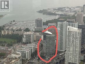 Toronto (Waterfront Communities) condo for rent - A cityscape with a red circle highlighting a specific building.