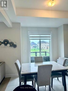 Oakville (Jm Joshua Meadows) townhouse for rent - A dining room with a table and chairs.