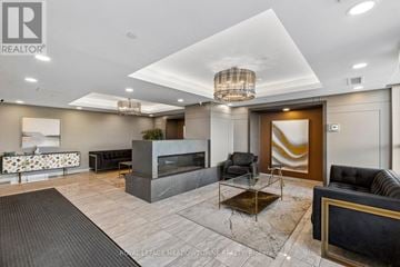 Lincoln (Lincoln Lake) condo for rent - A modern living room with a grey sofa and a coffee table.