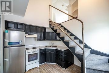 Niagara Falls (Cherrywood) apartment for rent - A kitchen with a stainless steel refrigerator and stove.