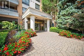 Toronto (Willowdale East) condo for rent - A building with a sign that says REALTOR in front of it.