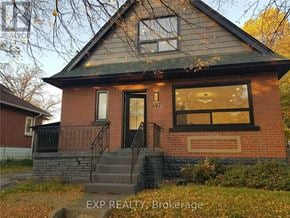 Hamilton (Eastmount) apartment for rent - A house with the number 467 on the front window.