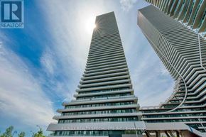 Toronto (Mimico) condo for rent - A tall building with a curved design stands next to a building with a straight design.