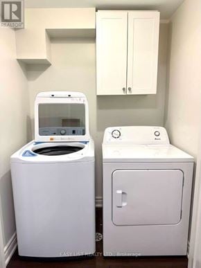 Toronto (Princess-Rosethorn) apartment for rent - A white washing machine and dryer in a small laundry room.