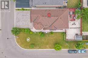 Brampton (Bramalea North Industrial) apartment for rent - An aerial view of a property with a red marker on the lawn.