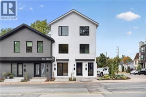 Dundas apartment for rent - A two-story building with a grey facade and a white facade is shown.
