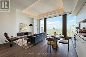 Toronto (Annex) condo for rent - A modern living room with a view of the city.