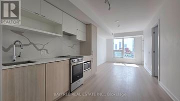 Toronto (Church-Yonge Corridor) condo for rent - A kitchen with a sink, stove and oven.