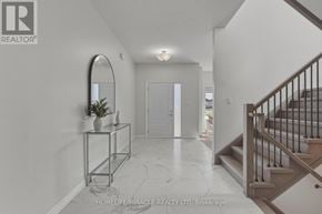London South (South V) apartment for rent - A hallway with a marble floor and a staircase on the right.