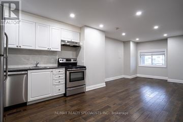 Toronto (Weston-Pellam Park) apartment for rent - A kitchen with white cabinets and a stainless steel dishwasher.