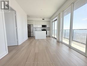 Toronto (Mimico) condo for rent - A spacious kitchen with a view of the city.