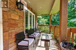 South Stormont apartment for rent - A patio with a table and chairs is surrounded by a brick wall.