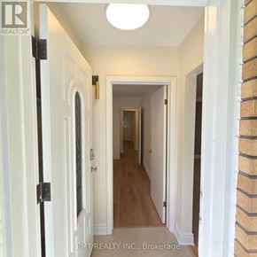 Waterloo apartment for rent - A hallway with a door on the left and a door on the right.