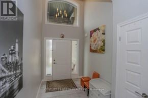 London North (North C) apartment for rent - A hallway with a door and a picture on the wall.