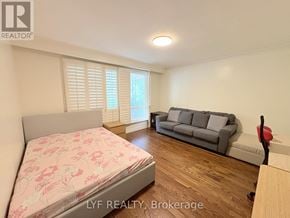 Markham (Unionville) apartment for rent - A bedroom with a bed and a couch in it.