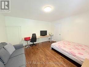 Markham (Unionville) apartment for rent - A bedroom with a bed, desk, and couch.