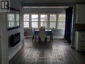 Tweed (Tweed (Village)) apartment for rent - A dining room with a table and chairs is shown in the image.