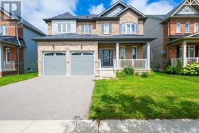 Brock (Sunderland) apartment for rent - A house with a grey garage door is for sale.