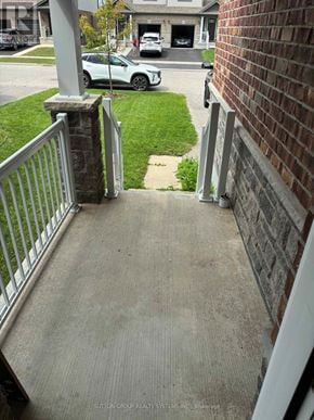 Woodstock (Woodstock - North) apartment for rent - A white car is parked in the driveway of a house.
