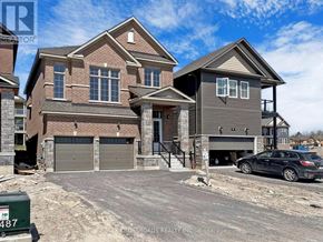 Peterborough (Monaghan Ward 2) apartment for rent - A house with a garage is being built in a residential area.