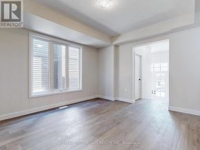 Peterborough (Monaghan Ward 2) apartment for rent - A room with wooden flooring and a window with blinds.