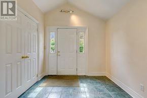 Oakville (Sw Southwest) apartment for rent - A hallway with a white door and a white wall.