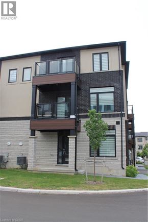 Cambridge townhouse for rent - A modern two story apartment building with balconies.