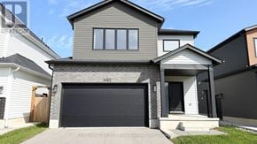 London North (North S) apartment for rent - A modern house with a garage door is for sale.