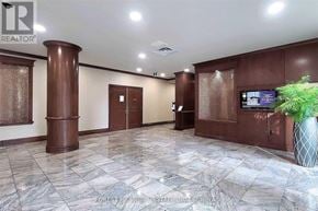 Toronto (Willowdale East) condo for rent - A reception area with a brown and white checkered floor.