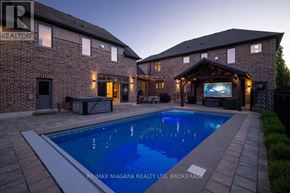 Niagara-On-The-Lake (St. Davids) apartment for rent - A house with a pool in the backyard.