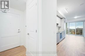 Mississauga (City Centre) condo for rent - A white door is on the left and a white wall is on the right.