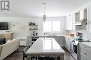 Ottawa apartment for rent - A modern kitchen with a large island in the center.