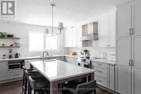 Ottawa apartment for rent - A modern kitchen with a large island in the center.