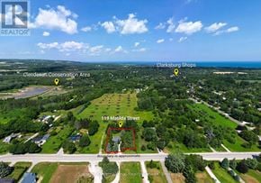 Blue Mountains apartment for rent - An aerial view of a property with a red boundary line and a sign that reads "119 Matilda Street".