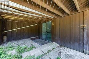 Toronto (Mount Pleasant West) apartment for rent - A room with wooden walls and ceiling, a door, and a window.