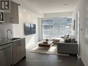 Toronto (Humber Heights) condo for rent - A modern kitchen with a dining area and a living room.