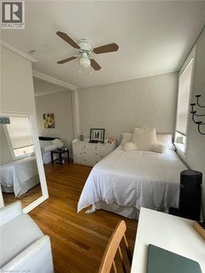 London apartment for rent - A bedroom with a bed, dresser, and mirror.