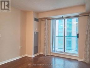 Toronto (Willowdale East) condo for rent - A room with a window and a door in it.