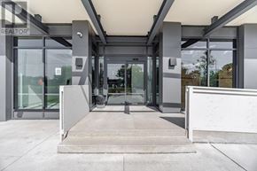 Toronto (Humber Heights) condo for rent - The entrance to a building with a glass door and a concrete floor.