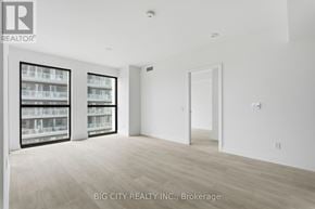 Toronto (Thorncliffe Park) condo for rent - A real estate office with a white wall and a window.