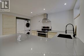 Barrie (Codrington) apartment for rent - A modern kitchen with a glass countertop and stainless steel appliances.