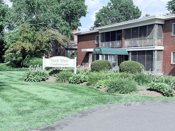 West Springfield apartment for rent - A sign for Park West Condominium stands in front of a brick building.