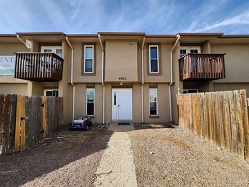 Colorado Springs apartment for rent - A building with the number 6490 on it.