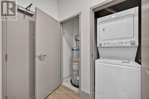 Brockville house for rent - A white oven and dishwasher are installed in a kitchen.