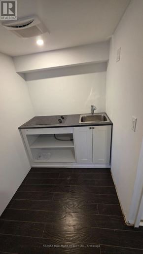 Pickering (Bay Ridges) apartment for rent - A small bathroom with a sink and toilet.