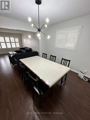 Toronto (Eglinton East) apartment for rent - A dining room with a table and chairs.