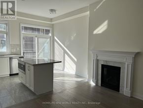 Markham (Angus Glen) townhouse for rent - A well-lit kitchen with a fireplace and a dishwasher.