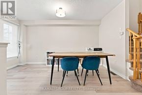 Newmarket (Woodland Hill) townhouse for rent - A room with a table and chairs in it.