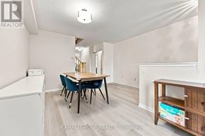 Newmarket (Woodland Hill) townhouse for rent - A room with a dining table and chairs.